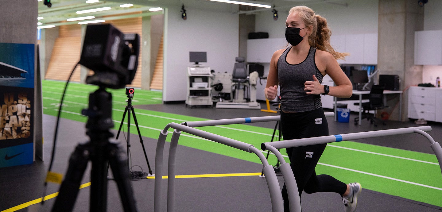 Woman running on treadmill in Bowerman Sports Science Center