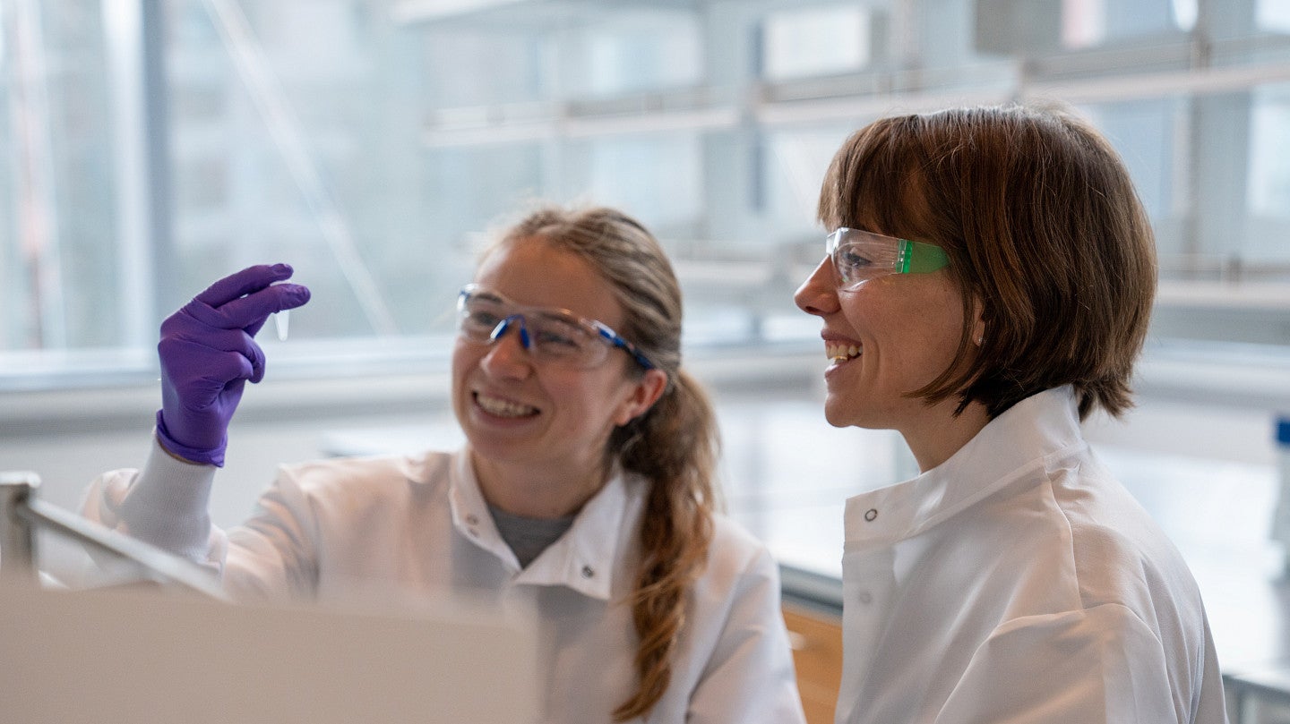 Two women in a science lab