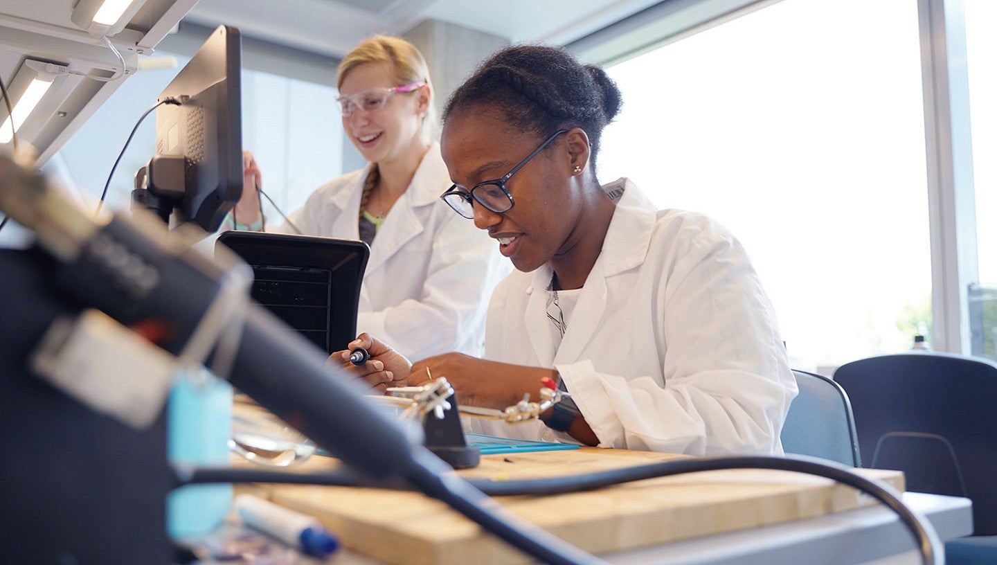 Students researching in Knight Campus lab