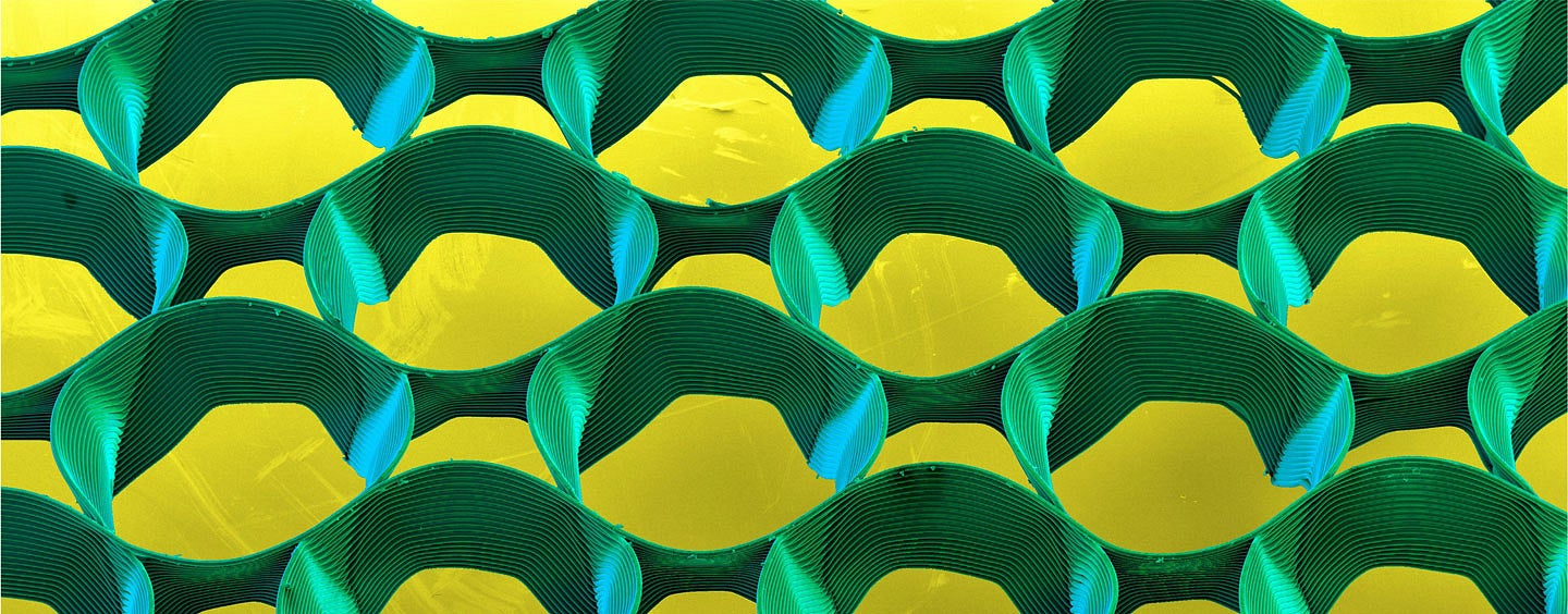 abstract cicular shapes (green), with a yellow background - printed using Melt electowiring. 