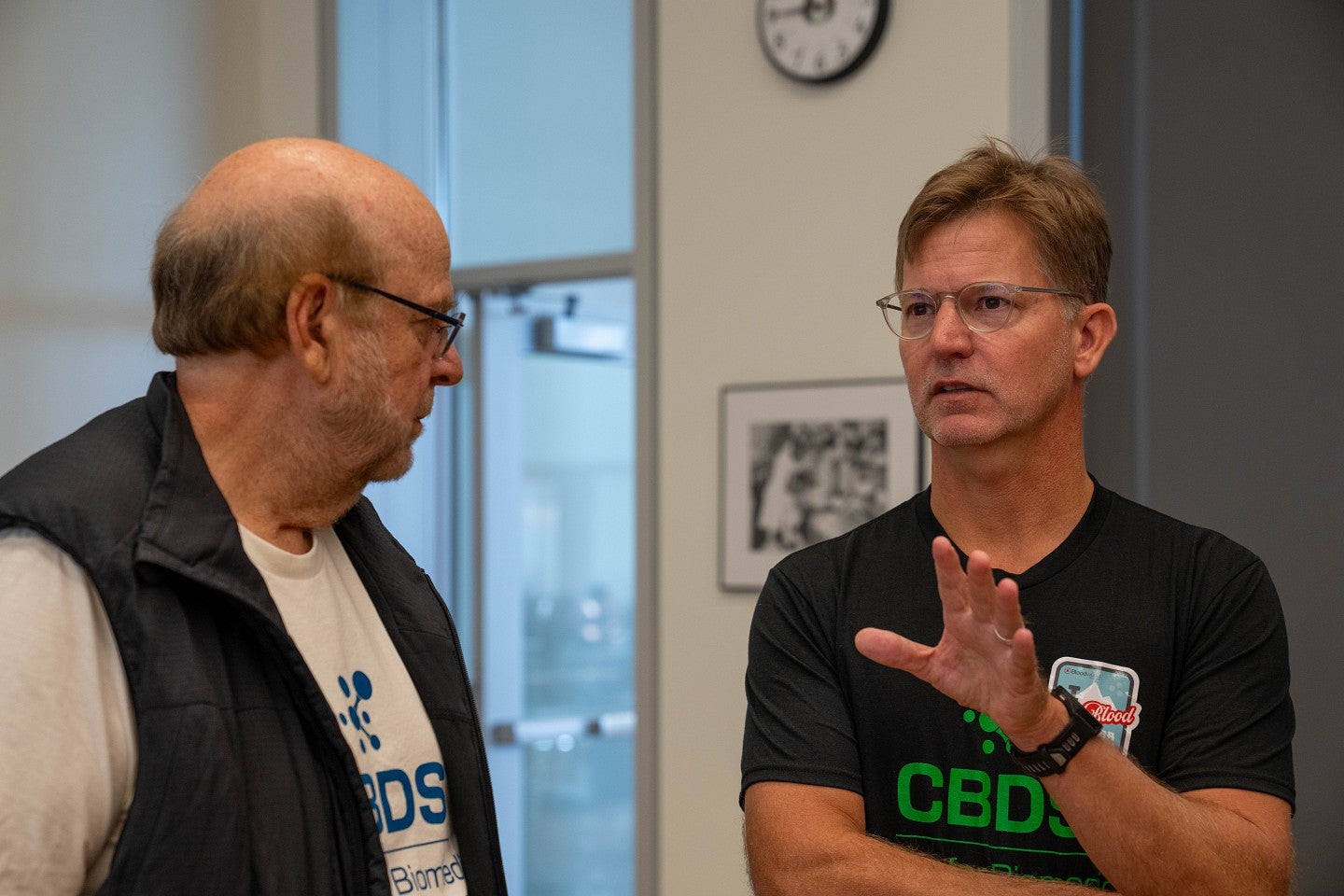 Sadik Esener (left) and Bill Cresko (Right), talking at the blood Drive