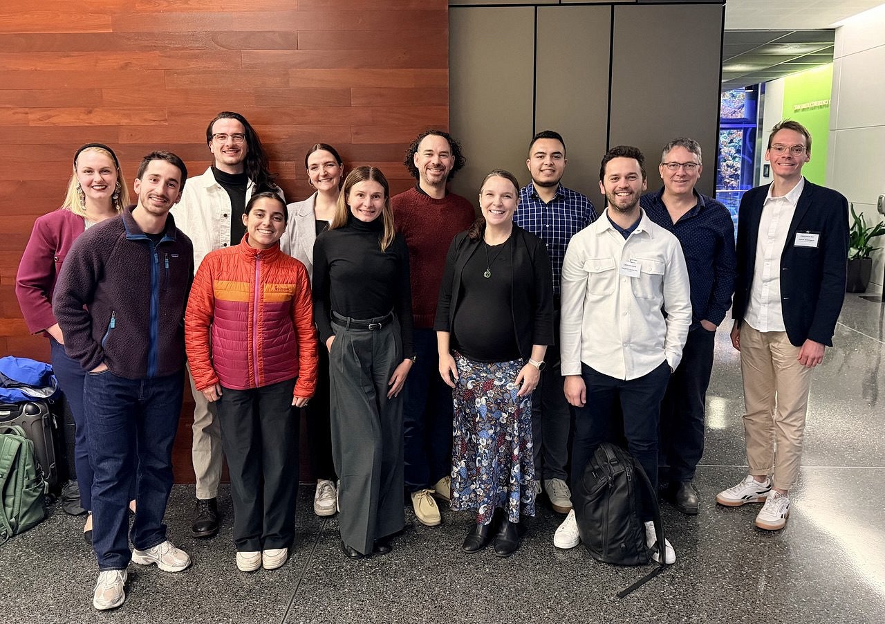 group photo of scholars at a conference