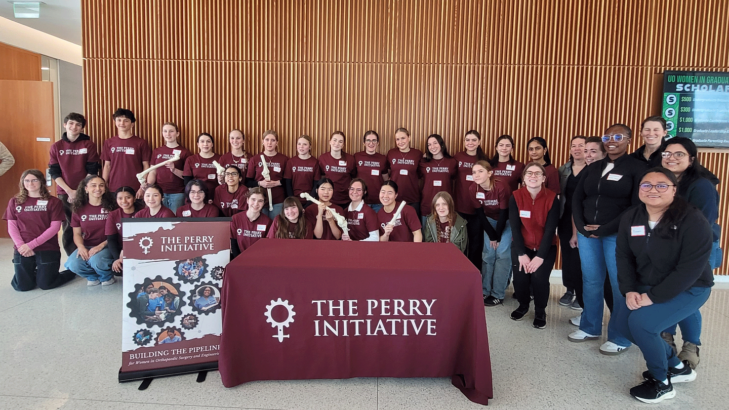 Group photo of 30 participating female high school students at engineering and surgury outreach event at the Knight Campus
