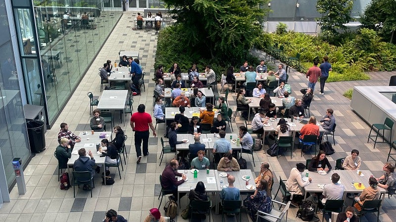 Students gather for lunch on the Knight Campus outdoor terrace