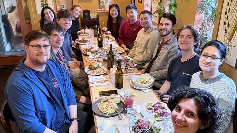 group at a table over lunch