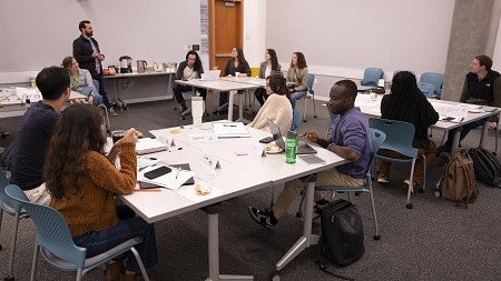 2024 PhD Bioengineering Cohort seated in session during Impact week