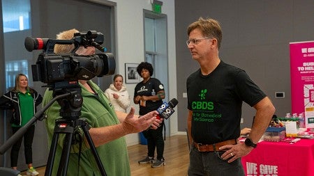 Bill Cresko, being interviewed by local KEZI9 TV station at a blood drive at the EMU on the UO Campus