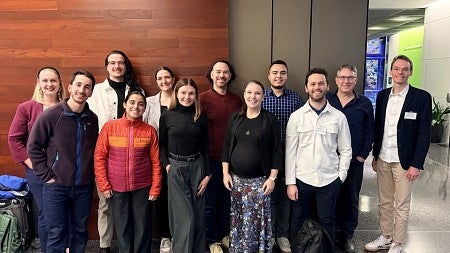 group photo of scholars at a conference