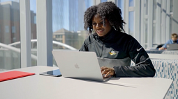 Human physiology-planning student Jailah Keller at desk in the Knight Campus