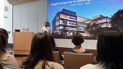 Research trainer Nathan Jacobs in front of students in seminar room