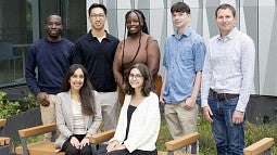 2024 Bioengineering PhD Cohort standing outside the Knight Campus building