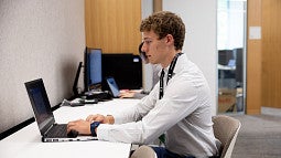 Student working at a computer