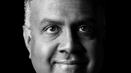 black and white portrait with text overlay and underlay of his name, reading "Bala" on top and "Ambati" on bottom