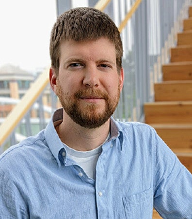 A man standing on a stairwell