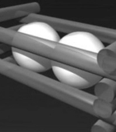 two white spheres in a gray grid