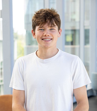 Headshot of Dylan Merrill