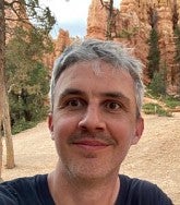 Headshot of man out in nature