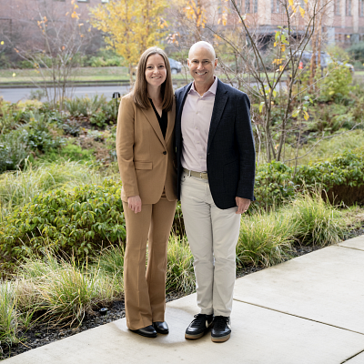 Williams and her advisor Bob Guldberg in front of the Knight Campus Sky Bridge